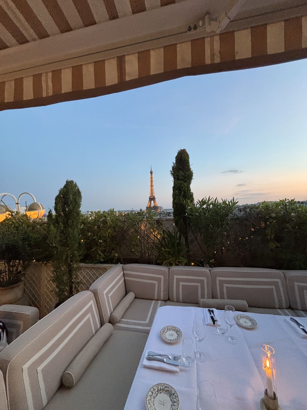 Outdoor dining setting at dusk